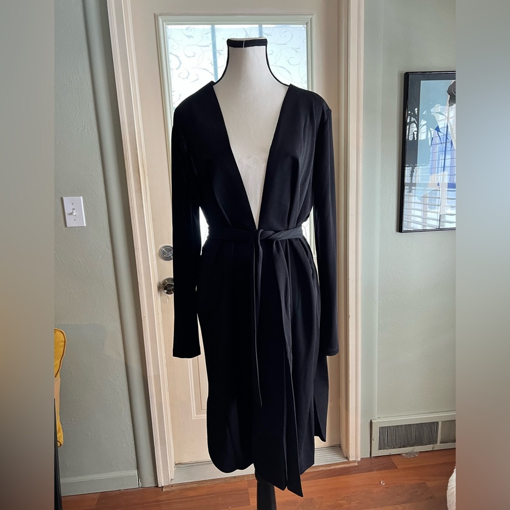 Donna Karan New York black chic cardigan with slits at side hem, longer length.